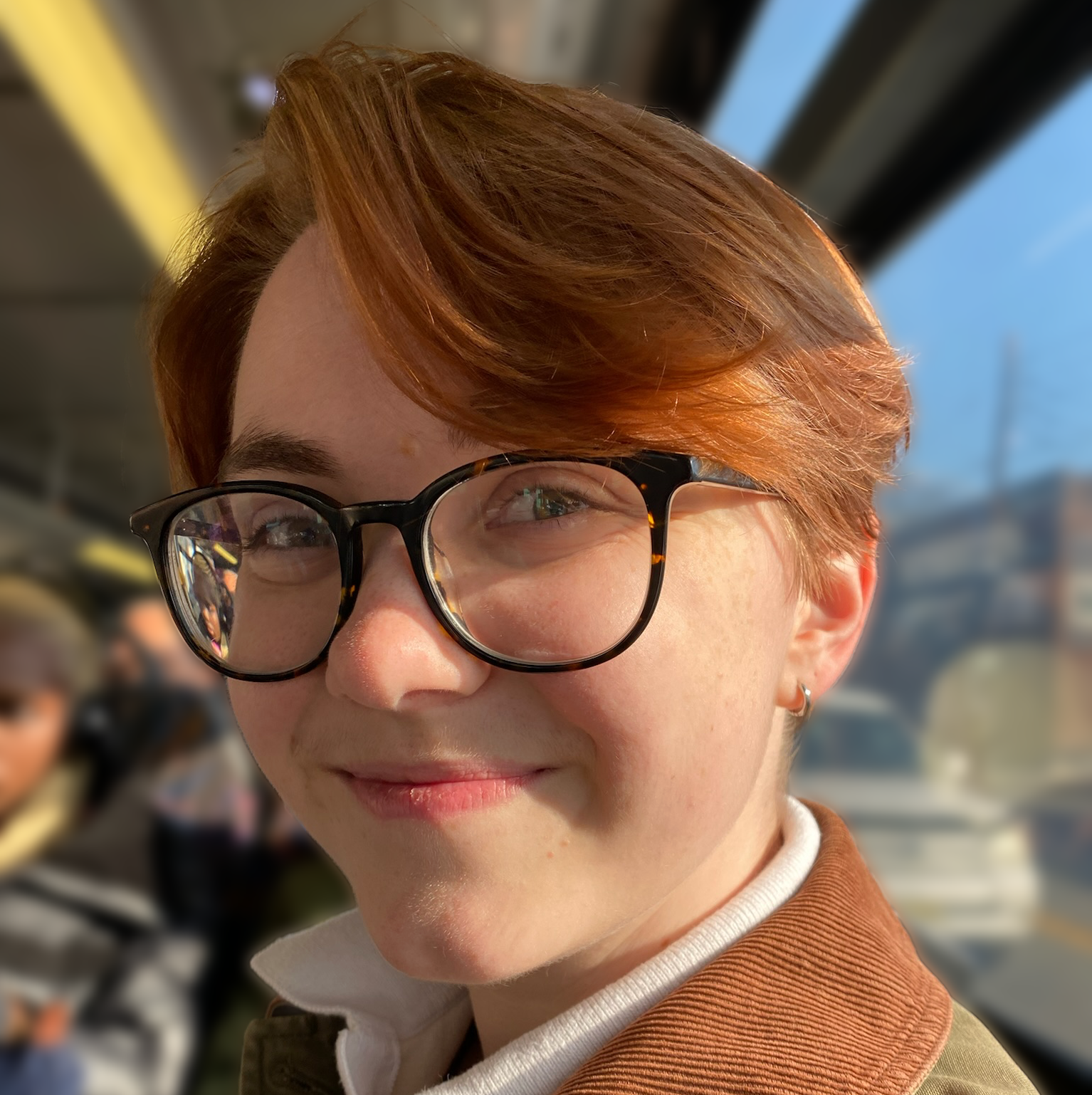 Headshot of Austen smiling.